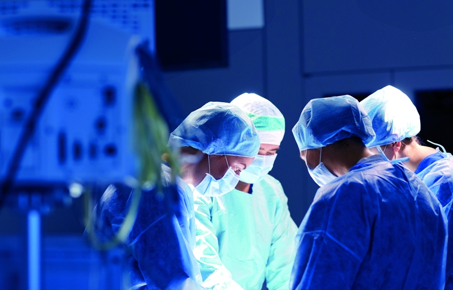 Surgeons at work in a theatre